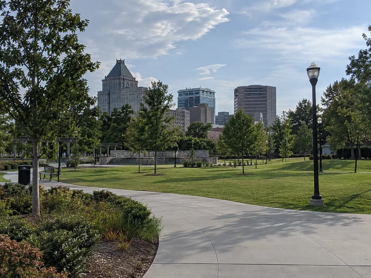 Park and skyline scene inspired by downtown Greensboro