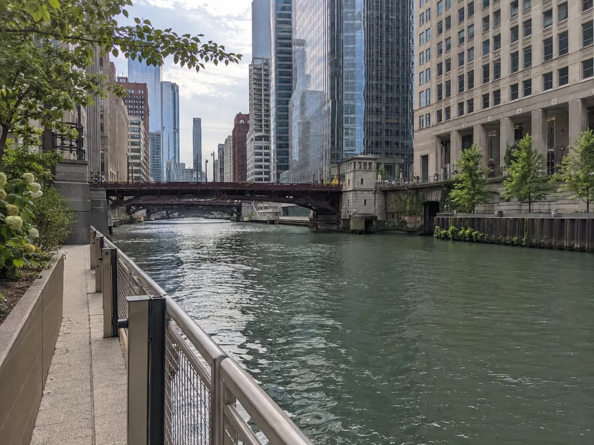 Downtown riverwalk scene inspired by the Chicago River
