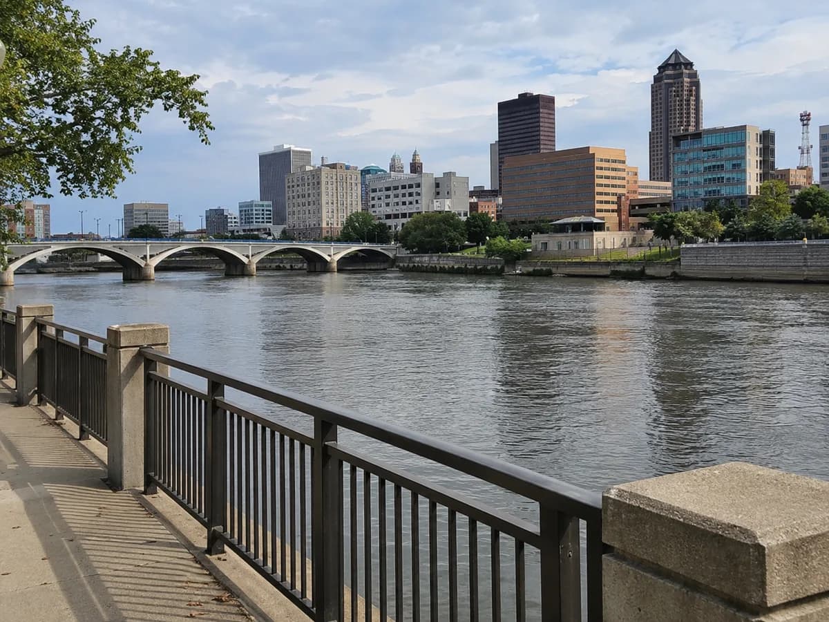 Downtown riverwalk scene inspired by the Des Moines River
