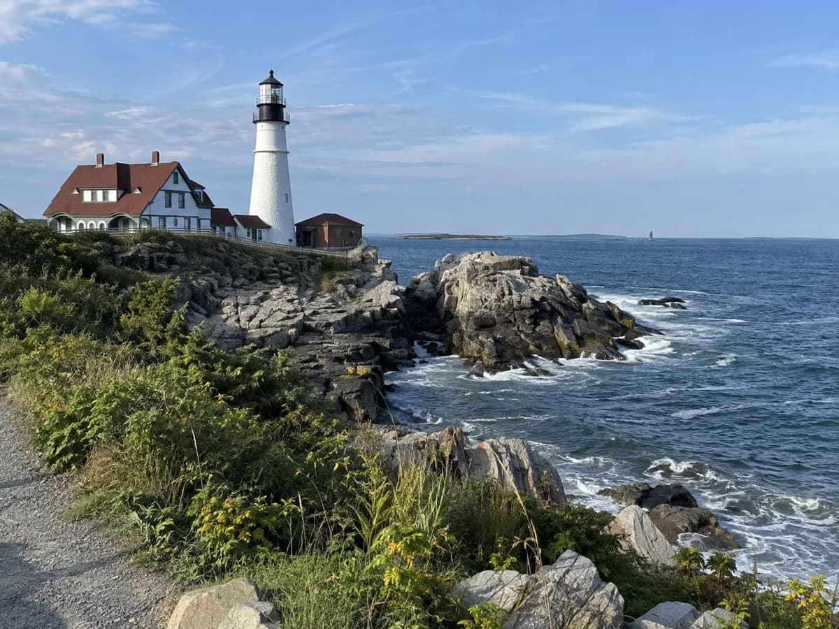 Coastal path view inspired by Portland Head Light in Cape Elizabeth