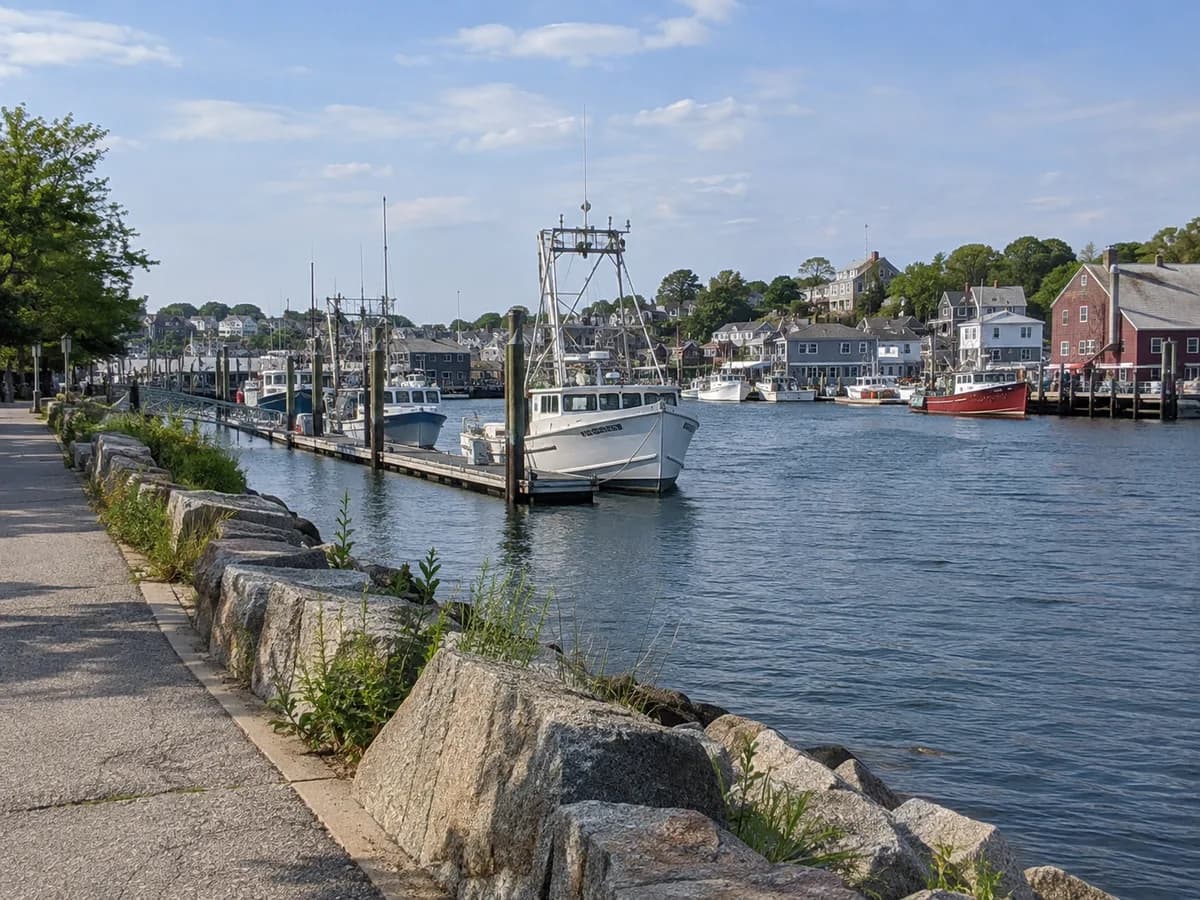 Fishing harbor walkway scene inspired by Gloucester