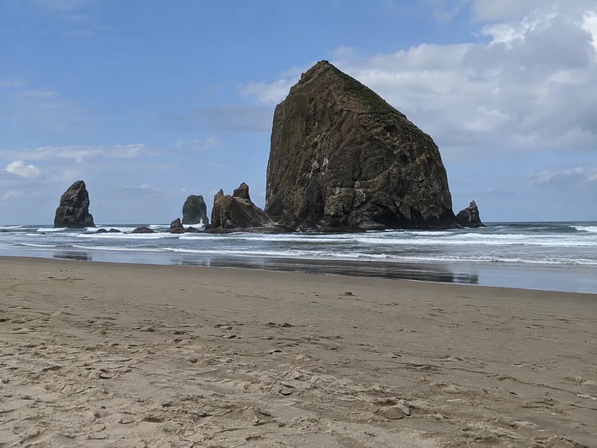 Beach scene inspired by Haystack Rock at Cannon Beach
