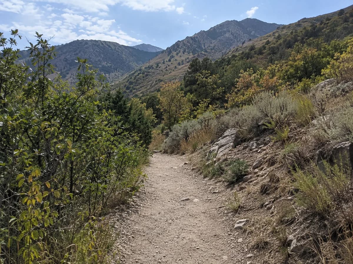 Mountain and public trail scene inspired by the Wasatch foothills